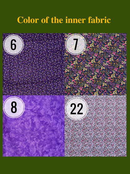 Four fabric swatches with different patterns and numbers on a green background